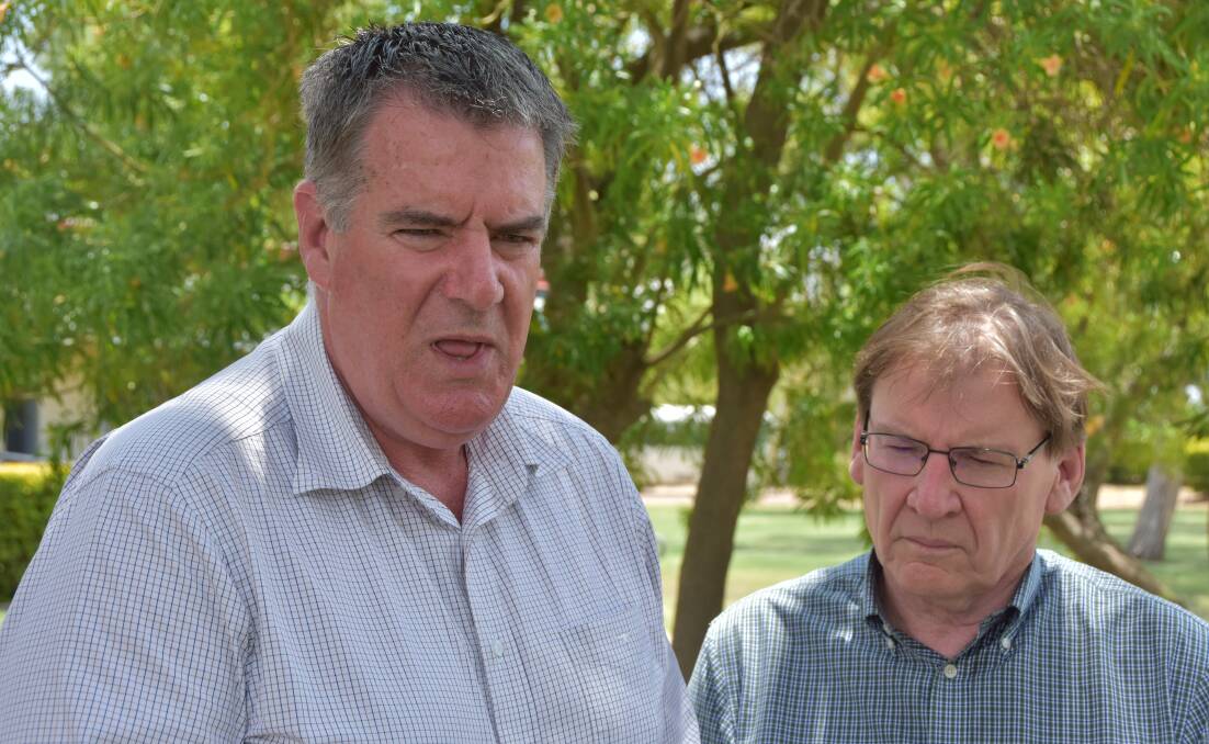 Agriculture Minister Mark Furner and Professor Peter Coaldrake announce that QATC will be shut at the end of 2019.