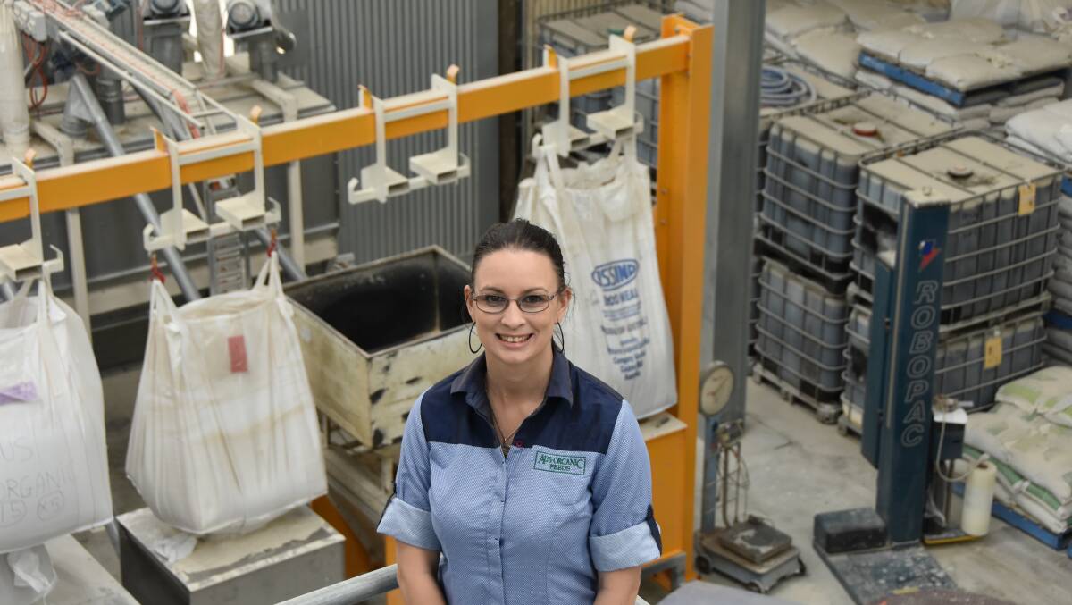 Aus Organic Feeds business development manager Lauren Hamilton in the company's packing warehouse. Pictures: Steven Trask