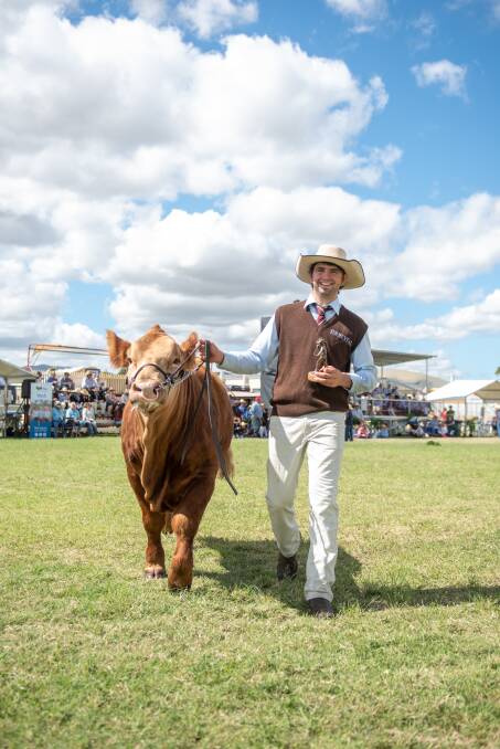 CHAMPION PARADER: John Delaforce had only two days of experience with his 13-month-old Simmental bull, which in the end proved a successful bond for the champion duo. 