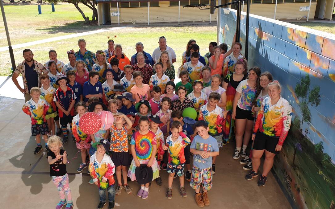 The Aramac community wearing their brightest and wackiest shirts to raise vital funds and awareness for children with hearing loss last year.