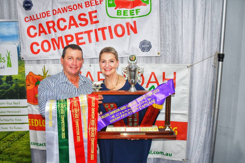 First time competition exhibitors, Ian Stark and Jeanne Seifert of Seifert Belmont Reds, with their champion trophy and ribbons they received back in 2023. Picture by Sheree Kershaw 