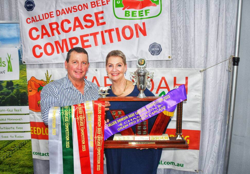 Husband-and-wife team Ian Stark and Jeanne Seifert of Seifert Belmont Reds, with their champion trophy and ribbons they received on the night for their winning entities. Picture by Sheree Kershaw 