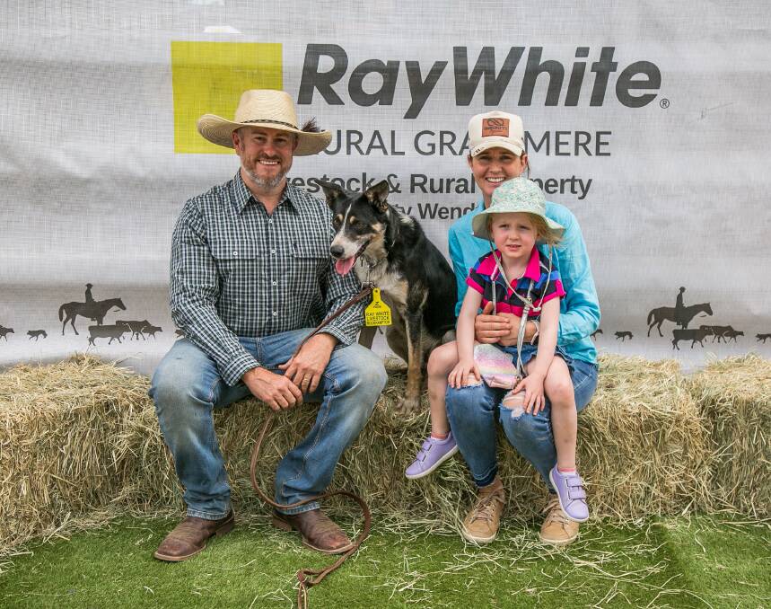 Cabra Glebe Sid, with vendor Joseph Leven, Casino, NSW, and buyer Helen Parker and daughter Macey, 3. Picture by Jodie Humble 