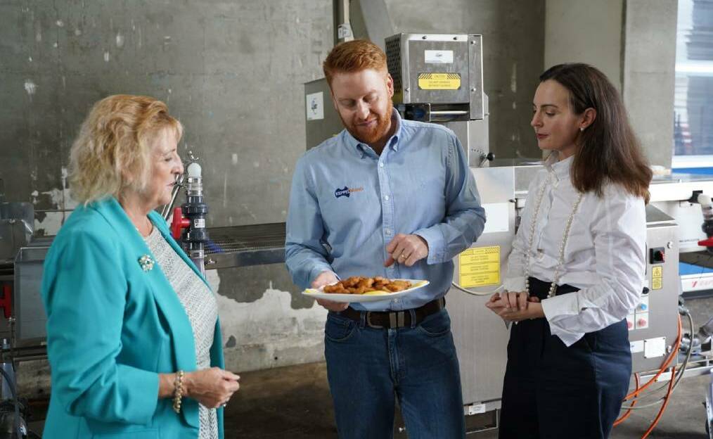 Capricornia MP Michelle Landry with Keppel Brand directors Mark Davie and Kelly Newton taste testing the new beef products the facility would offer. Photos: Supplied