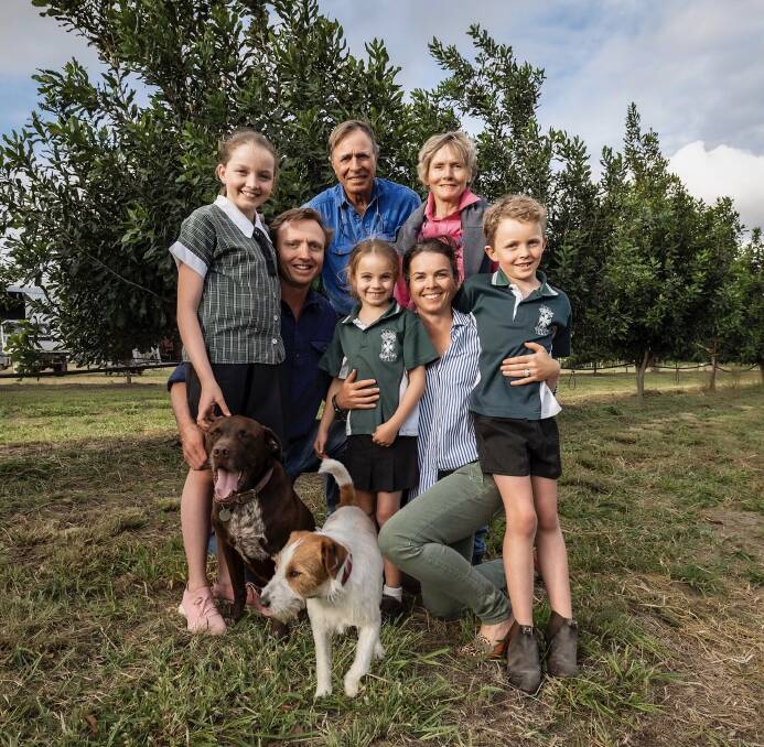 The Lewis family at their farm in Bundaberg. Picture: Supplied. 