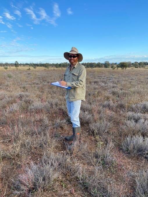 Principal Pasture Agronomist Stuart Buck in dieback affected pasture in Central Queensland. Picture supplied. 