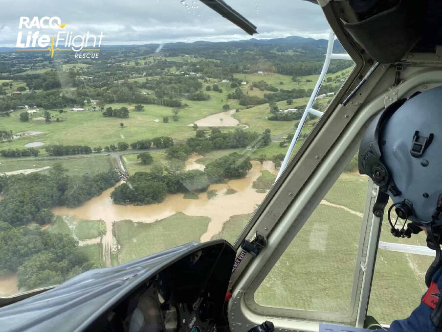 The Sunshine Coast-based RACQ LifeFlight Rescue helicopter has been called in to help with the search of a man missing in floodwaters at Gympie. Photo: LifeFlight 