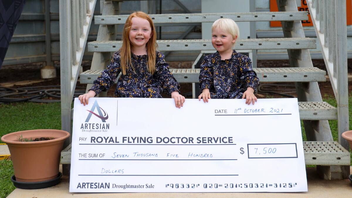CHARITY SUCCESS: Mikeely and Ayla Donaldson of Medway Droughtmasters, with a cheque for $7,500, donated by the six vendors to the Royal Flying Doctor Service. 