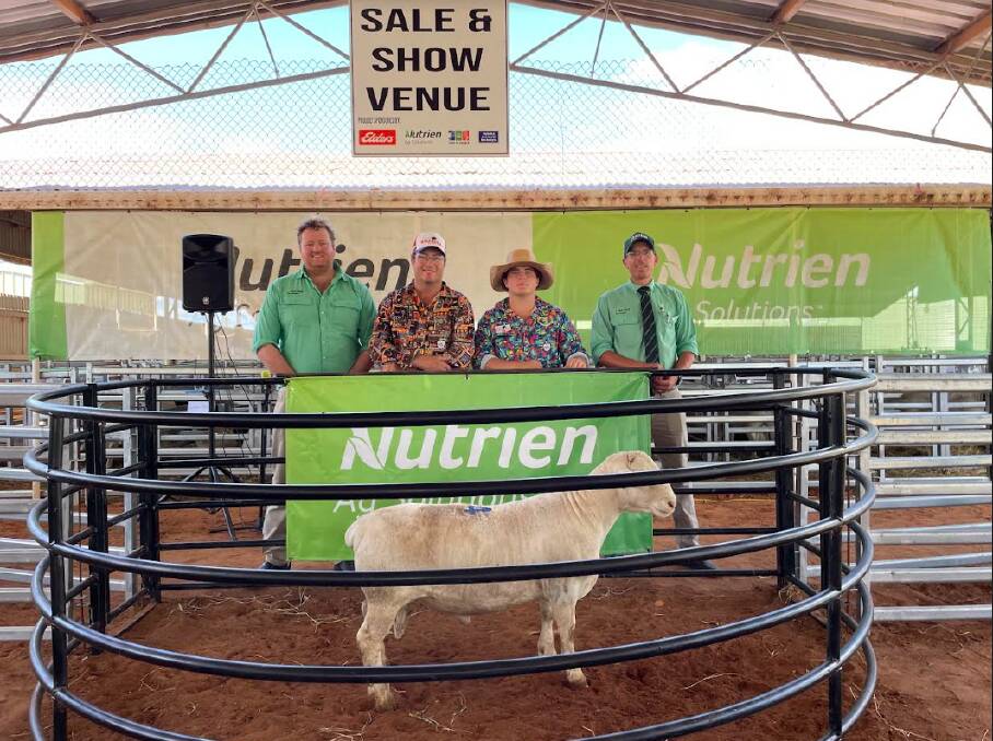 Top white Dorper ram, lot 34, Amarula 232553, with Nutriens' Gus Foott, vendor Justin Kirkby and his son Flyn, Amarula Stud, and Nutrien's Alex Stirton. Picture supplied by Colby EDE 