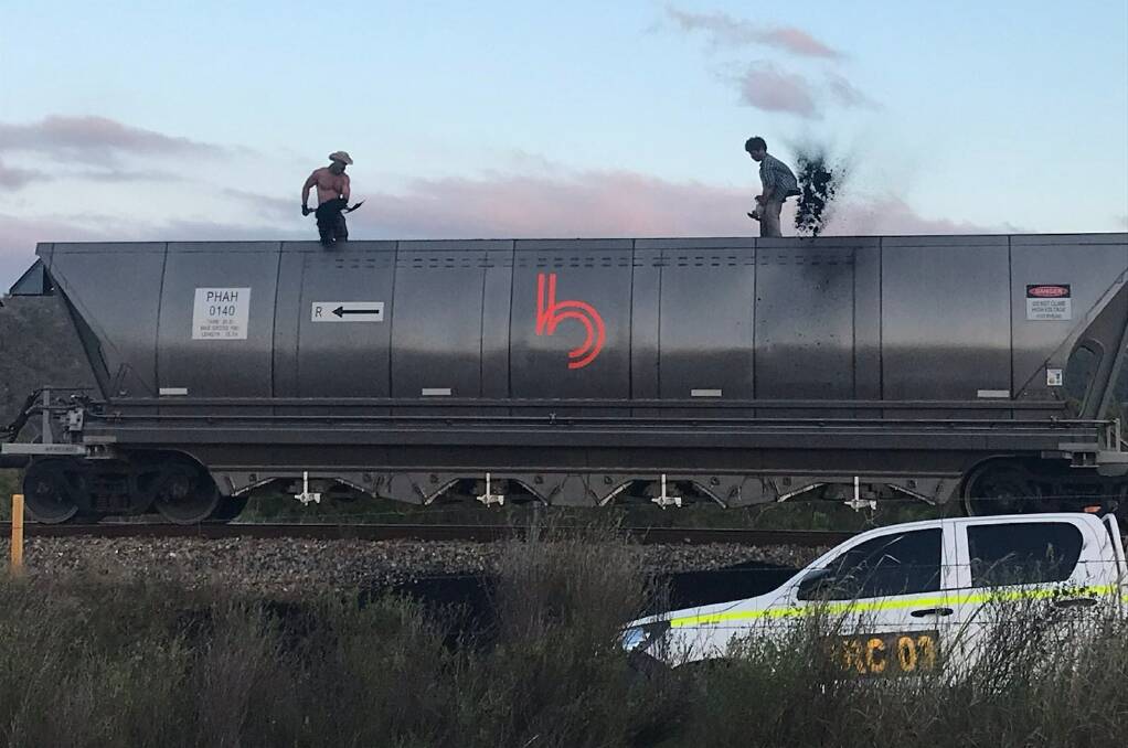 Frontline Action on Coal activists' climbed onto the coal train near Collinsville last Wednesday. Photo: Supplied
