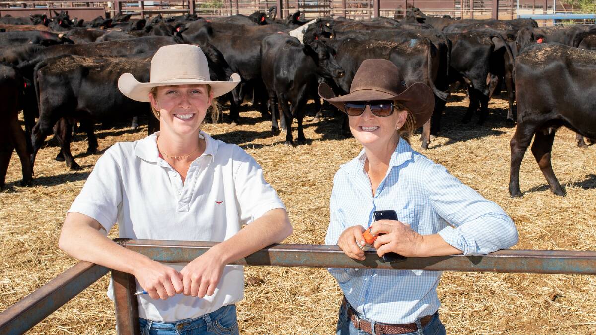 Isobel Thomson, AAMIG Business Graduate, and Clare McNeven, WQLX Manager, at the WQLX with a herd of organically certified cattle.