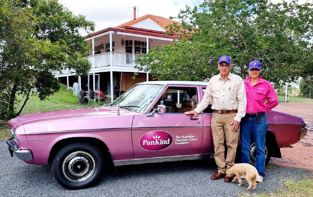 RAISING AWARENESS: Pacreatic cancer survivor and PanKind ambassador Ian Mundell with his wife Judi Goor-Mundell, Westwood,with their faithful dog Penny, standing beside Ian's recently restored 1974 HQ Holden. 