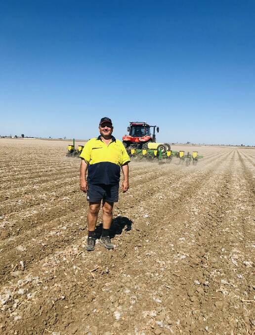 Andrew Keeley, Keeley Ag, Gindie checking the seed depth for his latest cotton planting. Picture - Molly Keeley 
