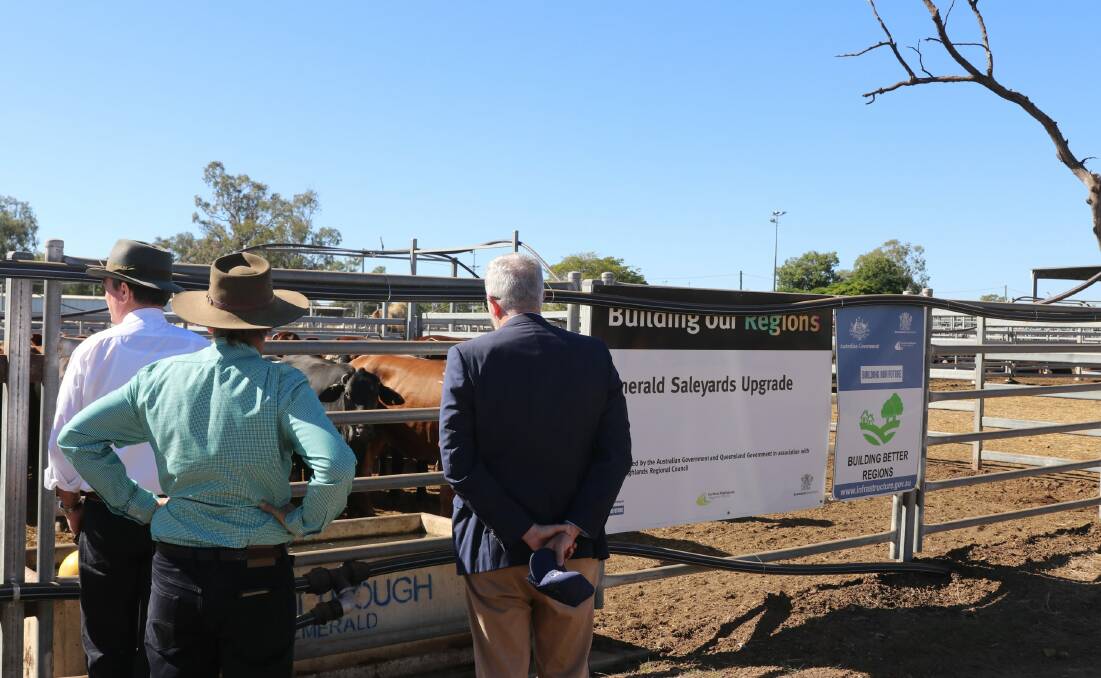 Mayor Kerry Hayes, Emerald saleyards manager Timothy Maguire and Senator Anthony Chisholm visited the saleyards earlier this month to inspect the new upgrades. Picture supplied 