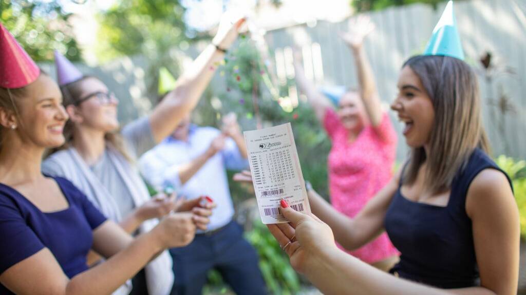 Remarkably, the woman revealed she only grabbed her winning Oz Lotto entry at the last minute yesterday after realising there was a $50 million jackpot up for grabs. Photo: Oz Lotto
