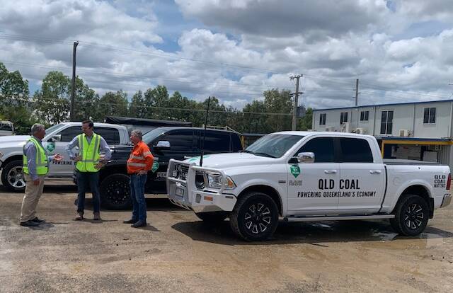 COAL CONVOY: LNP candidates Adrian de Groot, Keppel, and Tony Hopkins, Rockhampton, with LNP Queensland Senator Matt Canavan inspecting some of the vehicles decorated in pro-Queensland coal stickers heading down to Oakey for the rally.