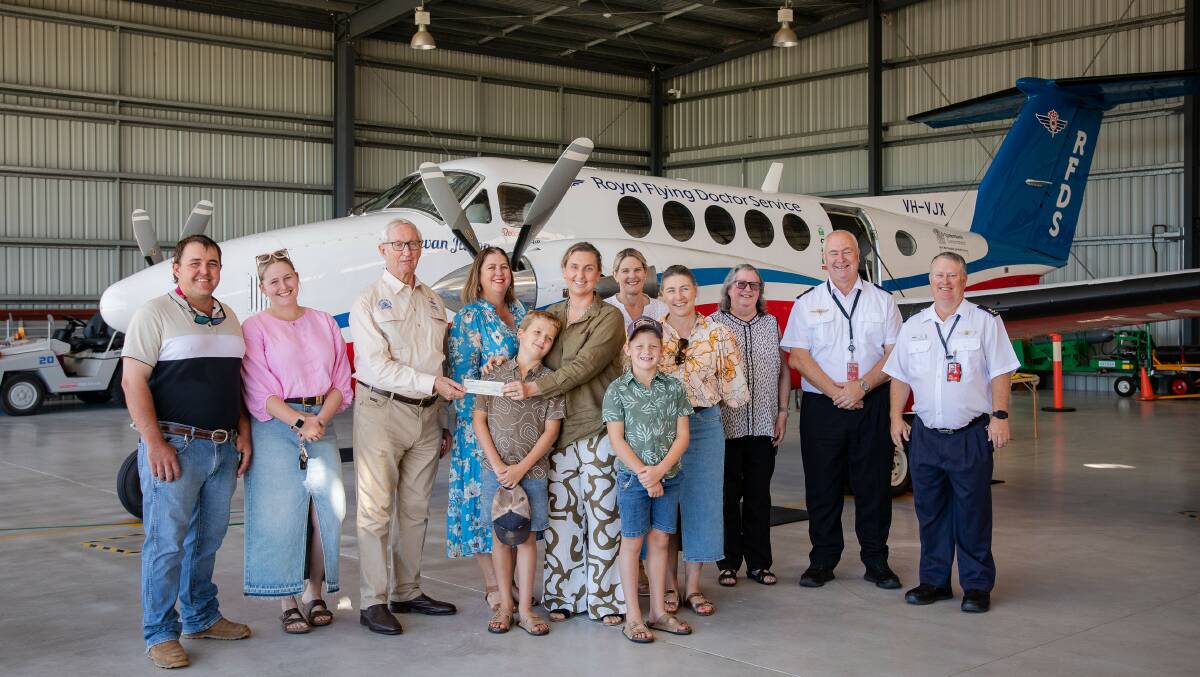 Ballin' on the Balonne committee members give the cheque to RFDS staff. Picture supplied by Trina Ayers 