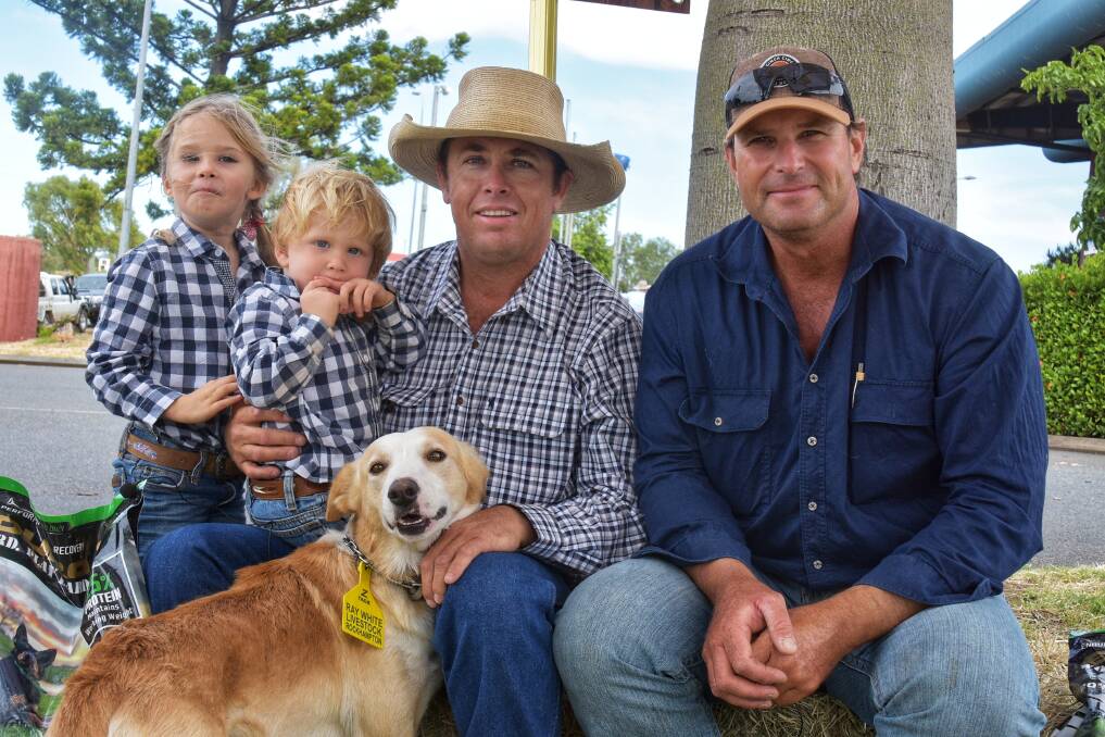 Shaun Carr, Wandoan, with his niece Shilo, 4, and nephew Sid, 2, his dog, Joey, and Dave Steel, Moura. Picture by Ben Harden 
