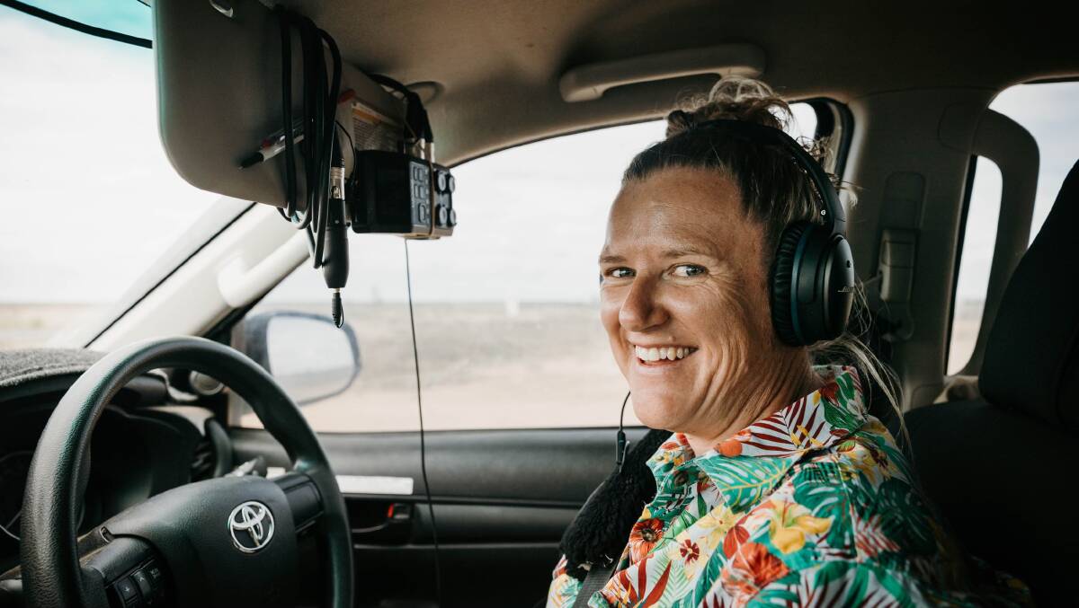 Postie Bec Climie records her podcast More Than Mail on the road. Picture by Sharon Maxwell Images.
