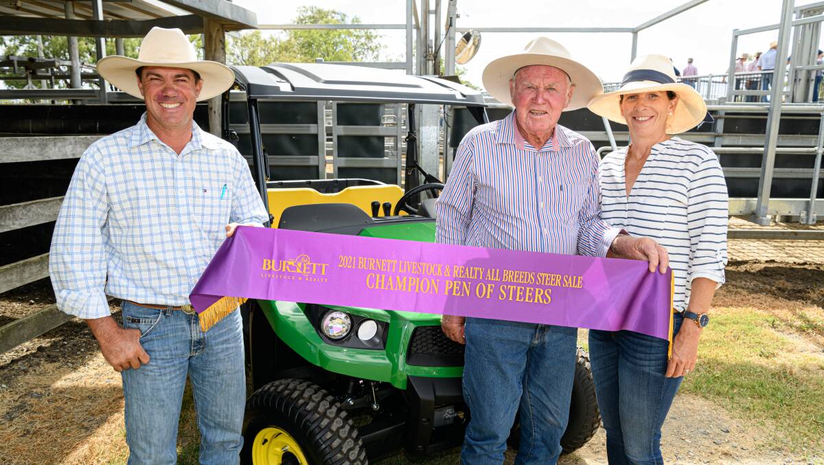 Alan, Neil and Natalie Goodland, Clare Grazing, Theodore, with their prize for the champion pen of steers, a John Deere Gator sponsored by John Deere and Vanderfield. The Goodlands also won the best pen of Charolais infused steers.