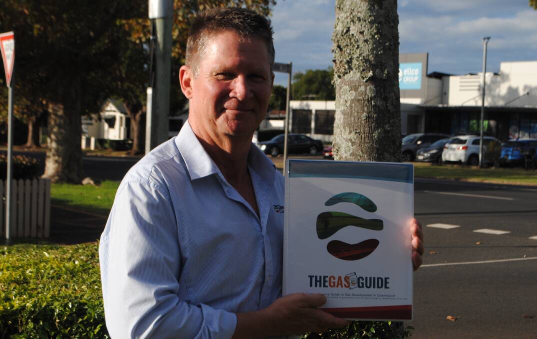 GasFields Commission communications director Murray Cornish with The Gas Guide.
