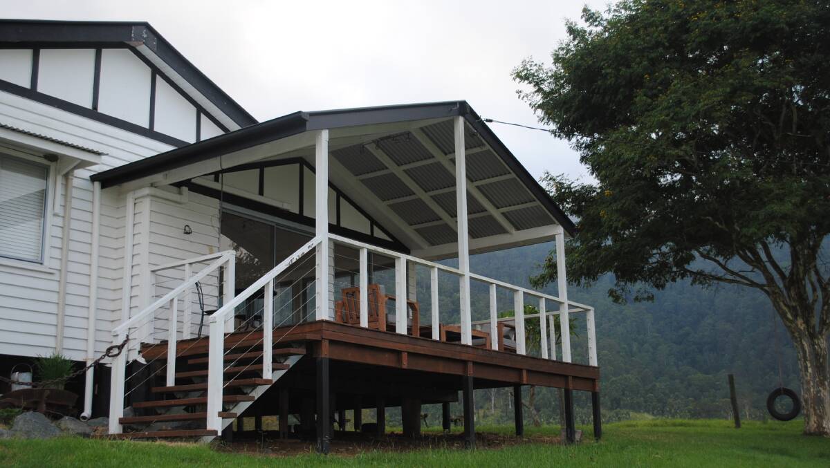 The cottage on Conondale Station offers bed and breakfast guests views of the lush paddocks.