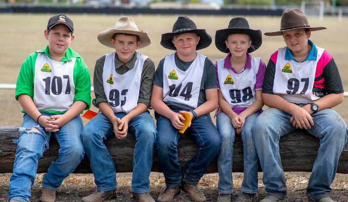 Brady Busiko, Lachlan Stone, Jack Downie, Lilly Hancock and Luke Hancock enjoy some down time at the Brahmousin cattle school held at the Nanango Showgrounds. Photo- The Martoo Review. 