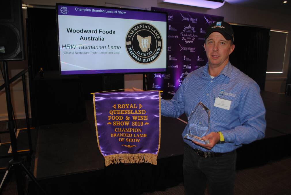 Woodward Foods Australia's Dean Loudoun with the prize for Australia's best lamb. 