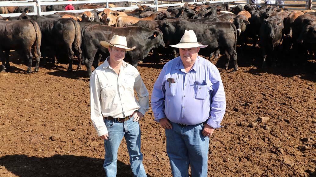 Taste of success: Edward Quinn, Voewood, Calliope and Waterfall Feedlot owner Robert Maudsley with steers involved in the 2018 Brangus Carcase Competition and Open Day held at Nangur Downs Feedlot, Tansey. Photo: Kent Ward.