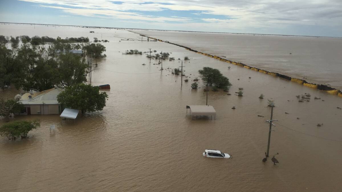 Train derailed in floodwaters at Nelia. Photo:Salvation Army Outback Flying Service.