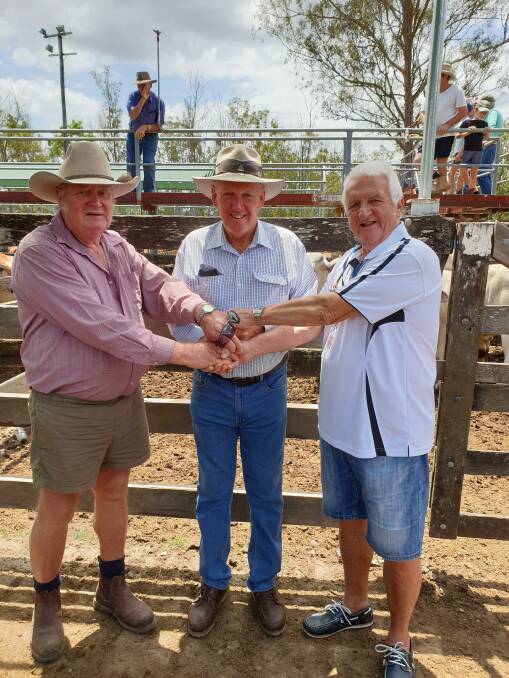  Livestock transporter Len Bargenquest, cattle producer Ken Ellis and RACQ LifeFlight representative Geoff Clements at the Gympie Saleyards.
