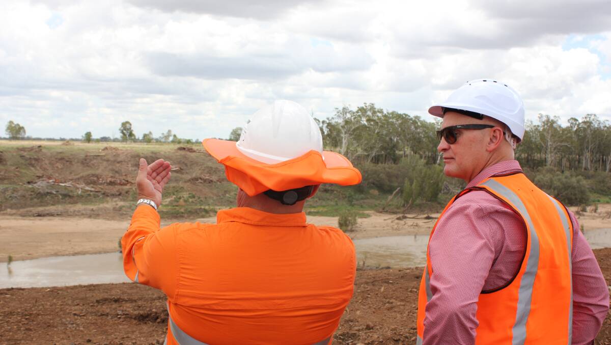 Water minister Glenn Butcher inspecting a dam construction site in Central Queensland