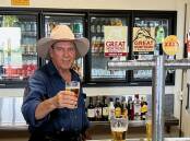 Owner Jeff Bambrick pours a beer at the refurbished Kalkadoon Hotel in Kajabbi. Photos: supplied