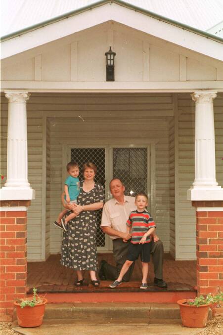 Tim Fischer with his family, Judy with sons Harrison, and Dominic, right, at their Boree Creek property when as acting Prime Minister Mr Fischer ran the country from his farm.