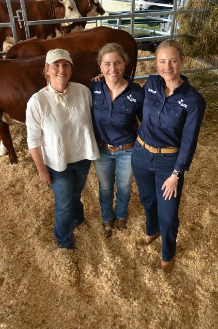 Central Queensland grazier Alice Marks, Clermont, and Black Box Co genomic clients manager Elsie Dodd and chief executive Shannon Speight at Beef Australia. Picture by Bryce Eishold