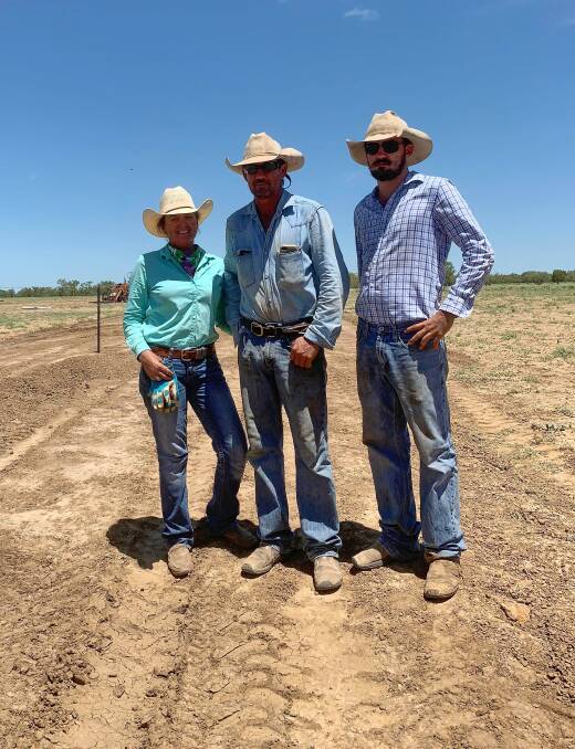 Emma Forster with her husband and son after a hard day's fencing at Werna Station near Winton. 