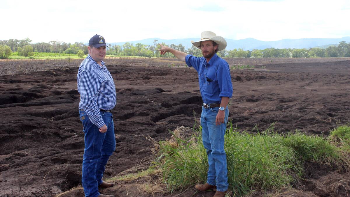  AgForce south east regional manager Andrew Sinnamon with Steve Munge, Bell,inspecting the crop and fencing damage at Bell.
