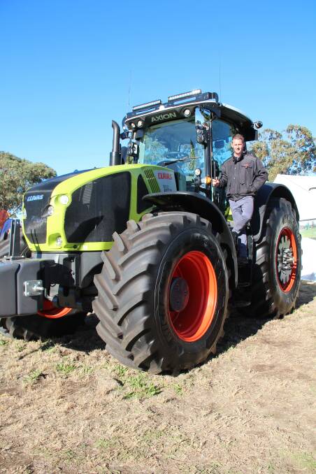 Claas Harvest Centre Dalby sales manager Anthony Eugarde with the Axion 950 tractor. 