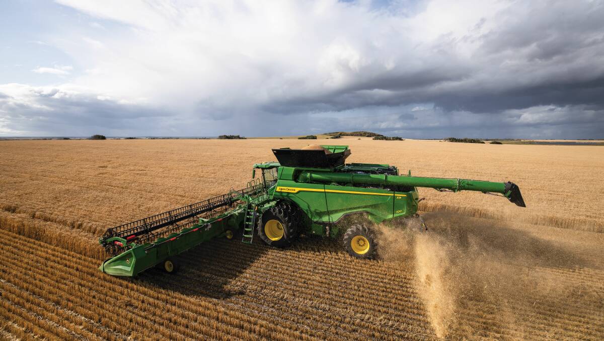 Machinery dealerships are reporting harvester sales are increasing as farmers prepare to take off this year's winter crop. 