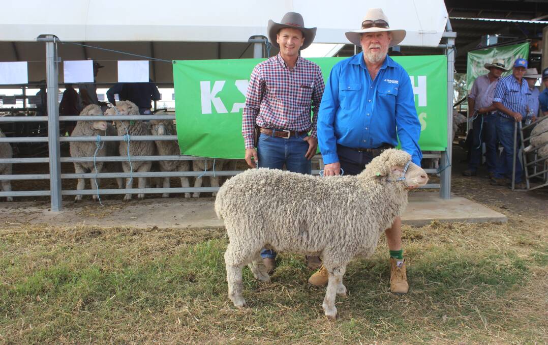 Jeremy Kinnon, Nogo Station, Longreach, with stud principal Mark Murphy and the top-priced ram at $6600. Pictures - Helen Walker