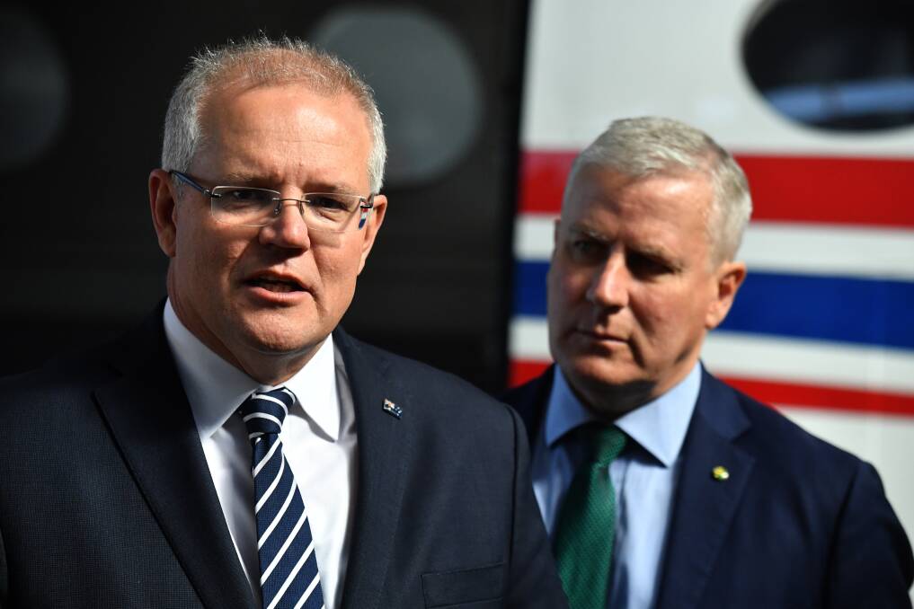 Prime Minister Scott Morrison and Deputy Prime Minister Michael McCormack at the Bush Summit in Dubbo. Photo AAP / Mick Tsikas. 