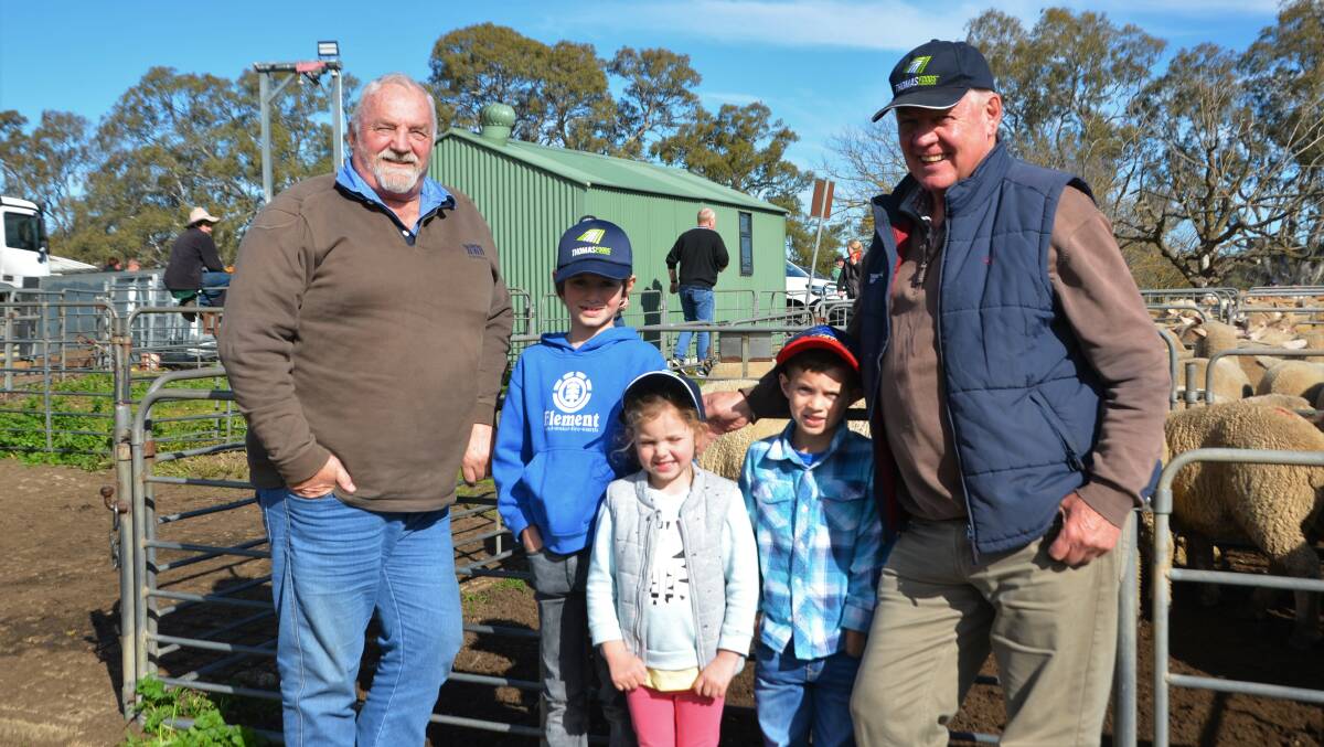 Ian Pfeiffer, Strathalbyn, SA, at Mt Pleasant, SA, recently with Charlie, Eliza, and Henry Beaumont, Mt Barker, SA, and their grandfather TFI's Phil Heinrich.