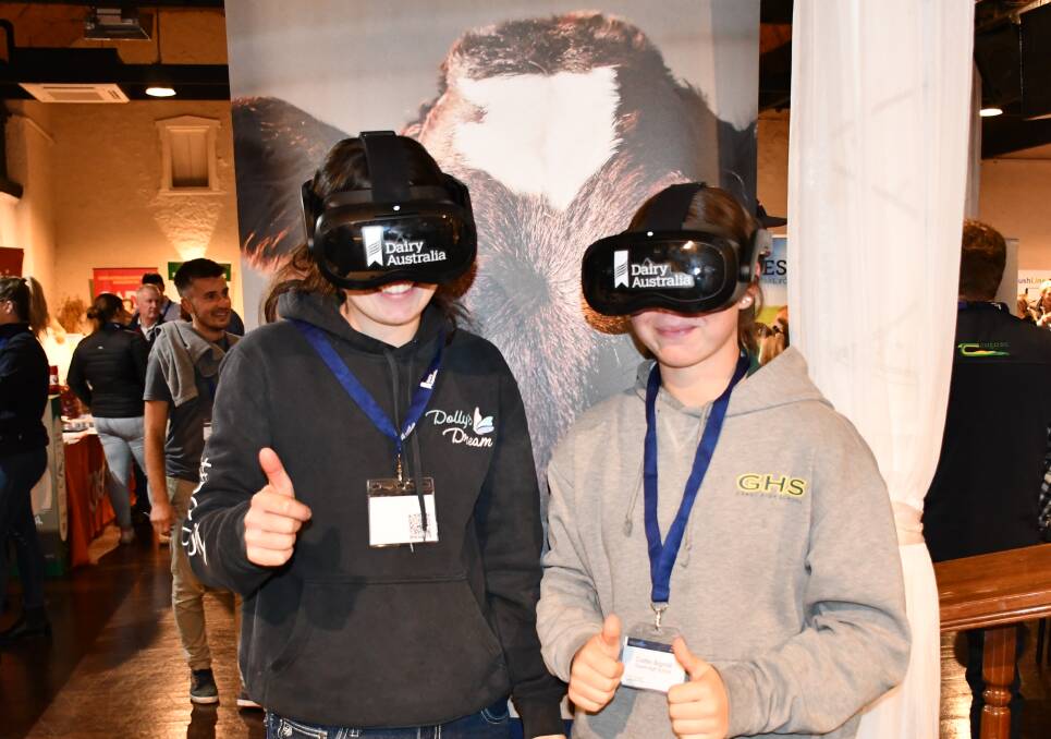Grant High School agriculture students Ruby Kenny and Caitlin Bignall experience a virtual reality dairy farm tour at the Dairy SA Innovation Day.