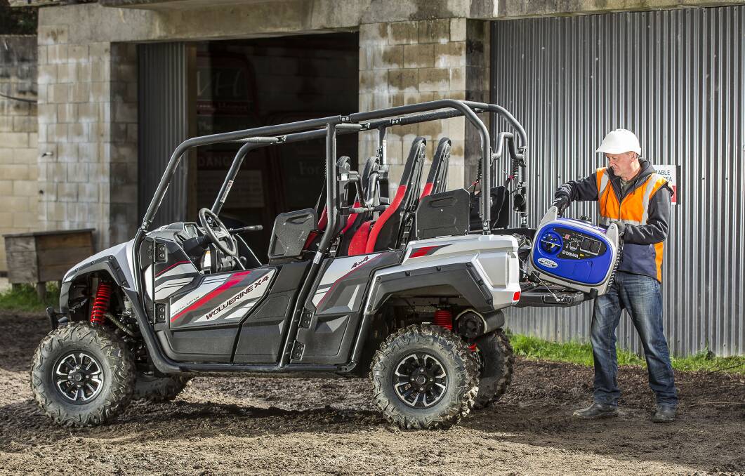 You can load up the Yamaha Wolverine with heavy equipment.