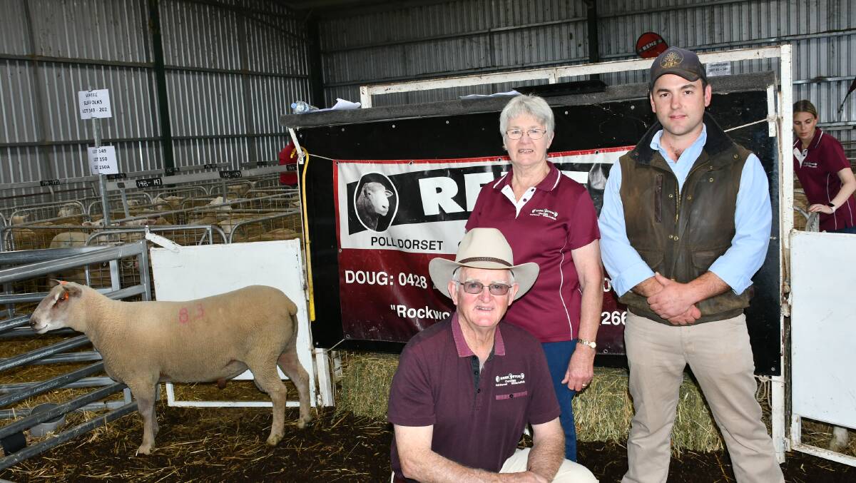 Rene stud principals Doug and Irene Mitchell, Culcairn, with top priced buyer Murray Bullen, David Hill Livestock, Wodong, an the $3800 top-priced Charollais ram.