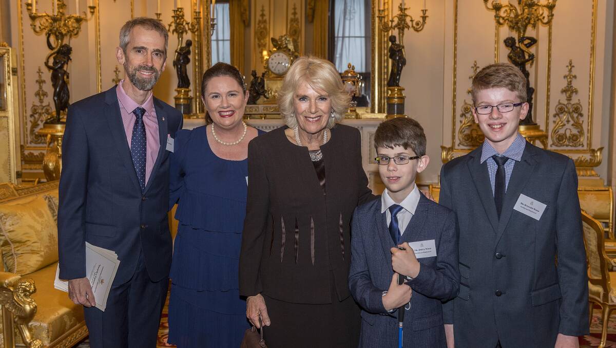 At the palace: The Wood family headed to Buckingham Palace to accept Joshua and Ben's award from the Duchess of Cornwall. Photo credit: Australian Women's Weekly