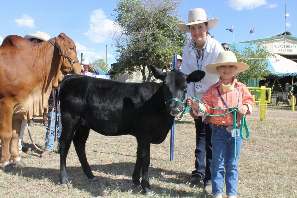Five-year-old Chloe Seeney led out the paraders with a confident showing with her Angus-cross heifer Betty, assisted by Emily Robinson.
