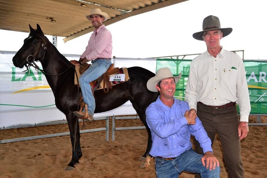 The Toomba sale topped at $32,000 when Ernest Bassingwaighte (on right) purchased Hillgrove Black Label from Jack Mann (left), Lochwall Station, Charters Towers. The horse is ridden and was presented by Harvey Wakeford, ChartersTowrs.