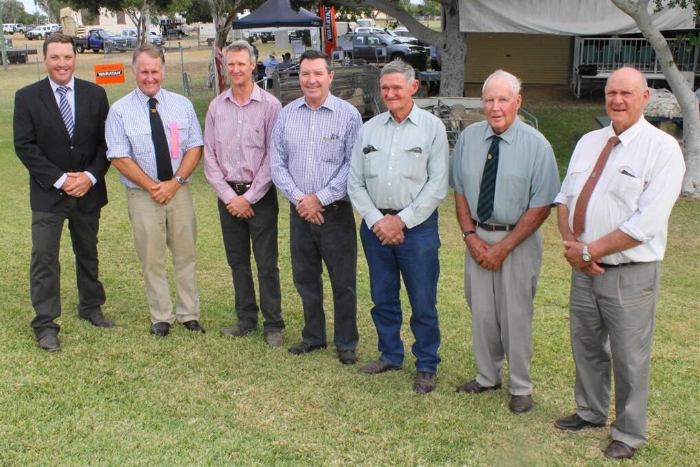 Wally Miller (second right), recipient of a Queen's Birthday honour this week, was part of a lineup of past presidents of the Barcaldine Show Society at its centenary celebrations in May - from left, Ben Chandler, Duncan Ferguson, Scott Counsell, John Chandler, Jim Allpass, Wally Miller and Bill Chandler.