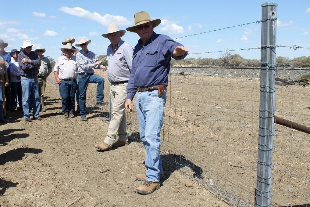 Longreach's Warwick Champion explains the theory behind fencing his country at a field day.